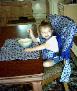 CONVERT-A-CHAIR FUNCTION OF THE TEND-A-TOT DIAPER BAG TOTE